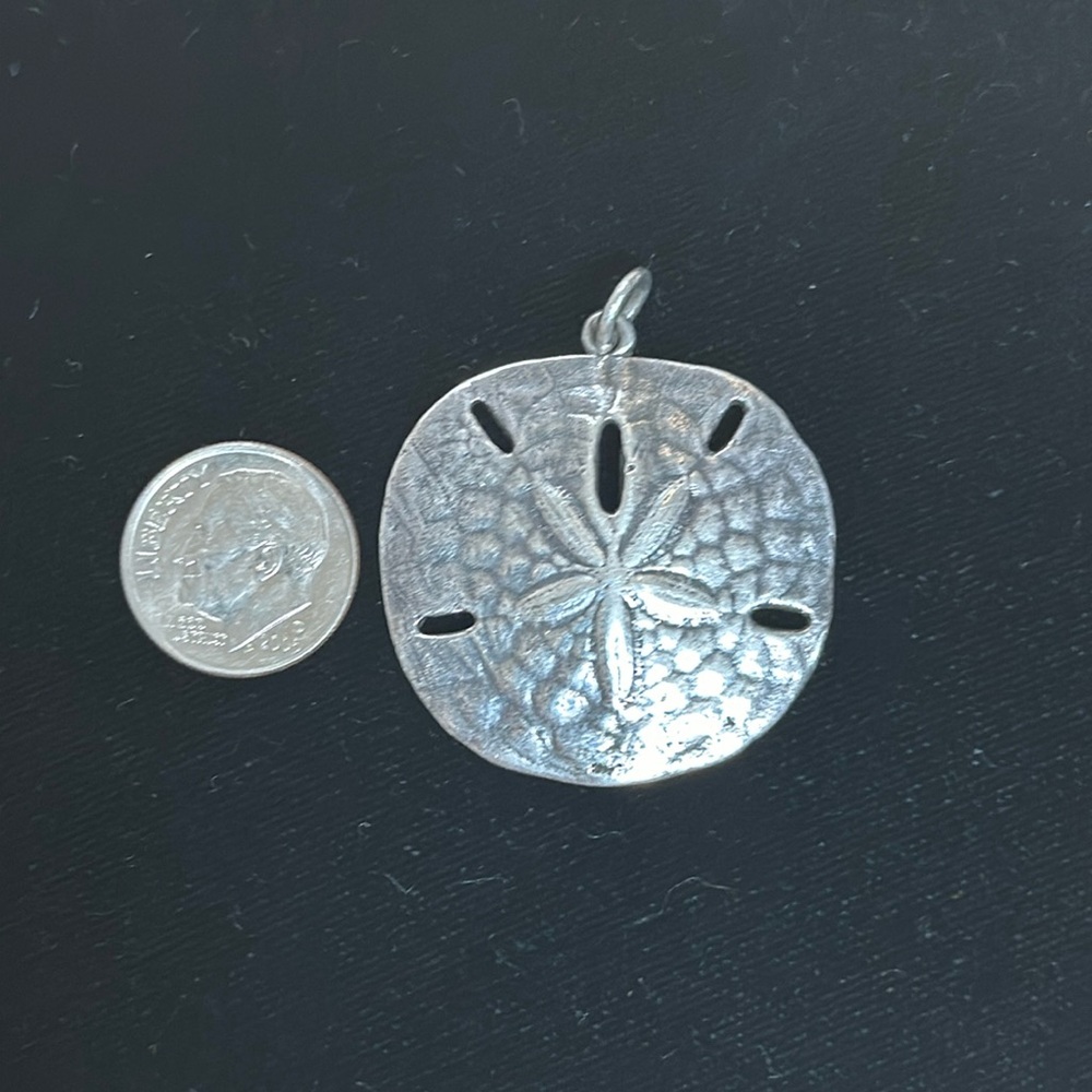 Retired James Avery Sandollar pendant